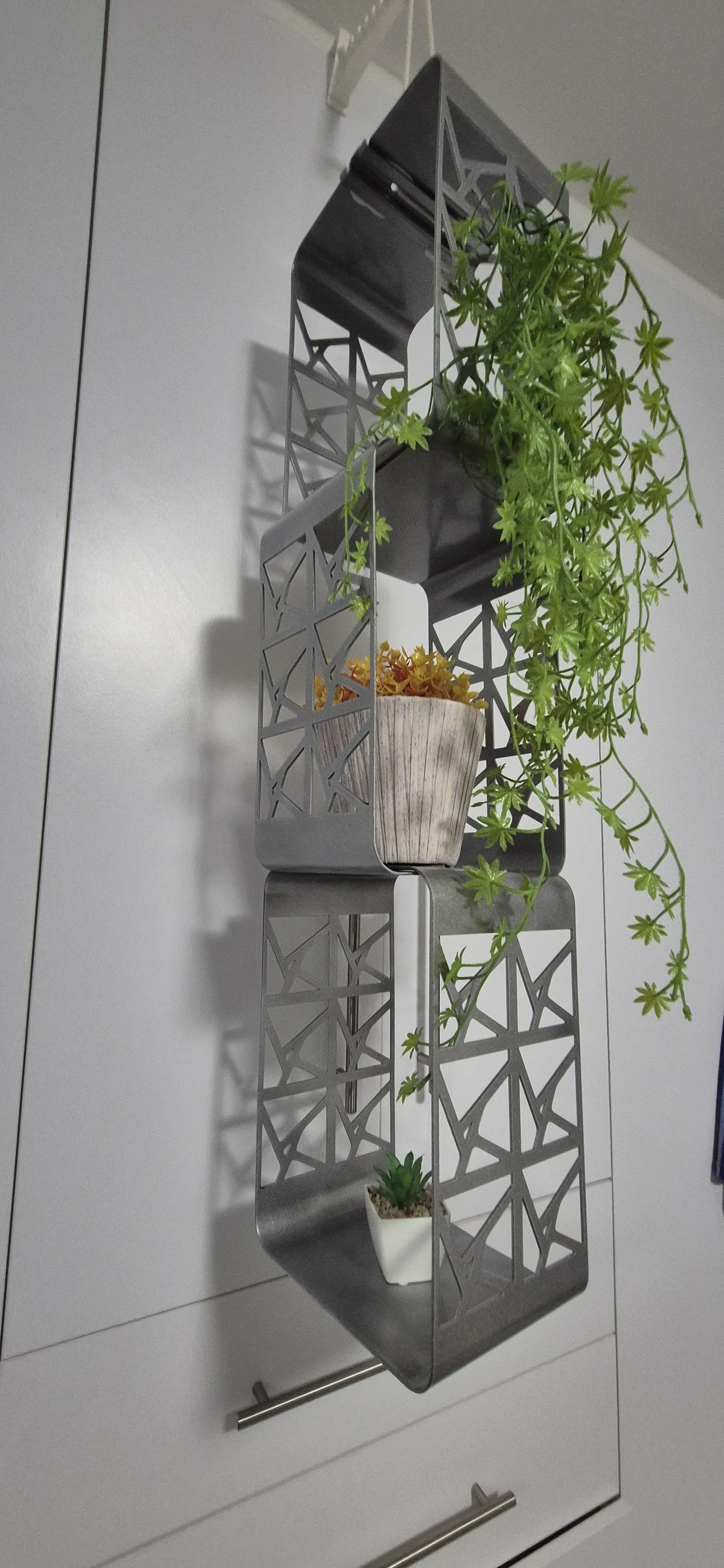 Full-height photo of the three stacked modules